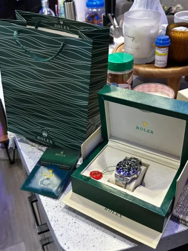 Replica Rolex GMT-Master II Black Dial 116710BLNR "Batman" photo review