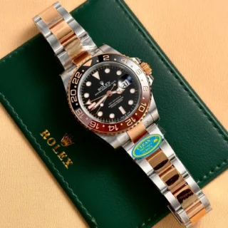 Replica Rolex GMT Master II Root Beer Black Dial rose Gold Two Tone Oyster Bracelet